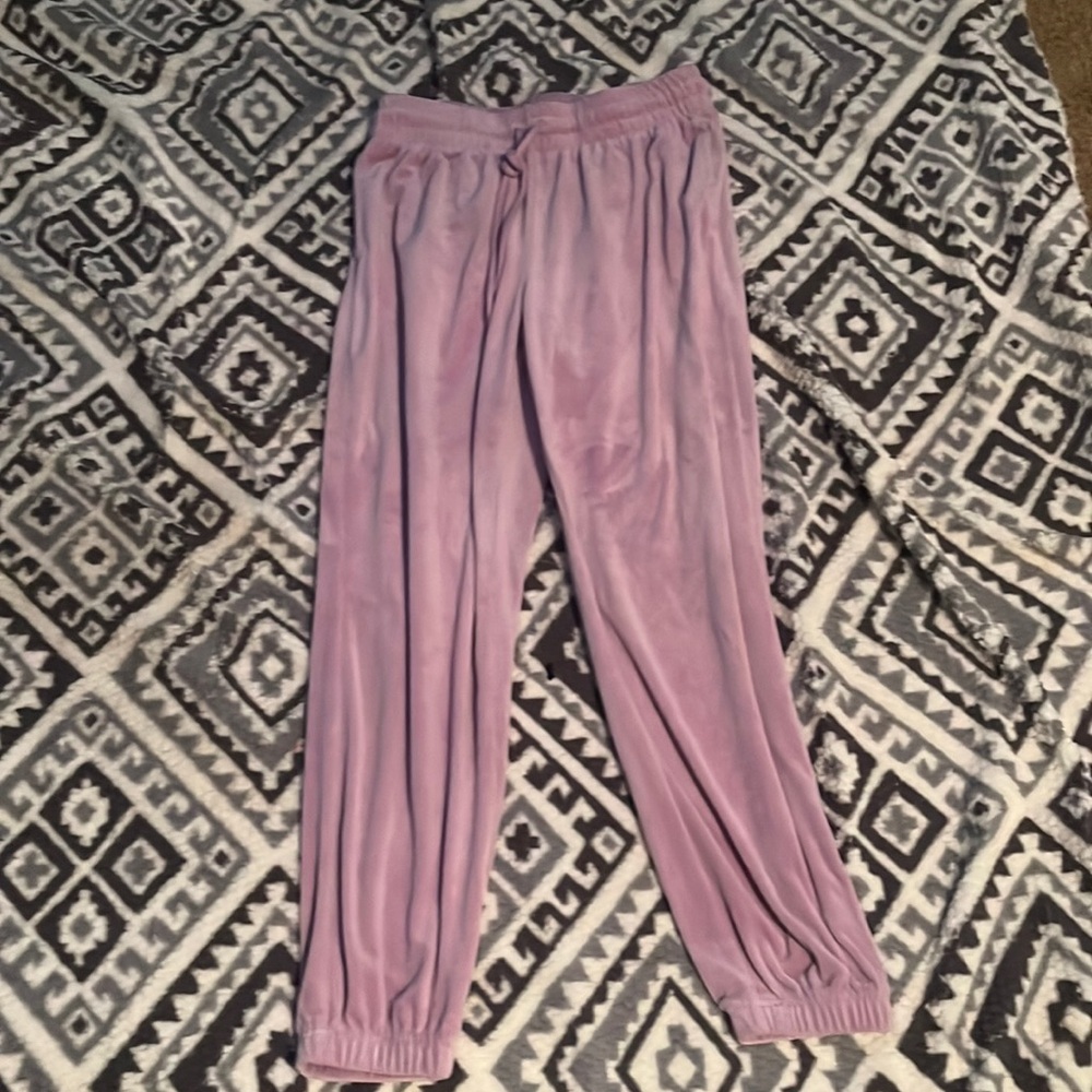 They are purple sweatpants kid size small four through six